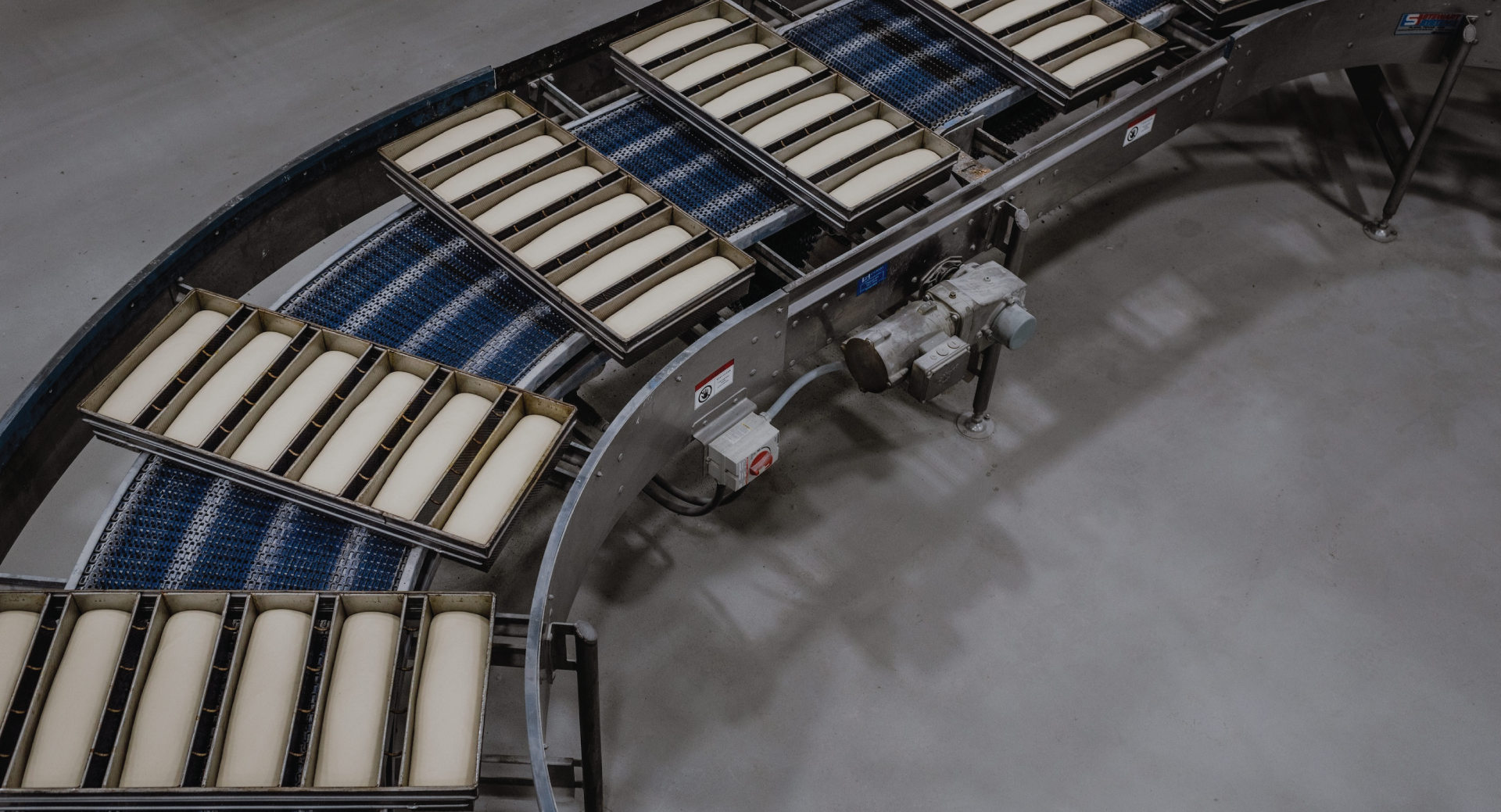 Industrial Bread Pans on Bakery Line
