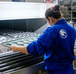 American Pan employee inspecting product